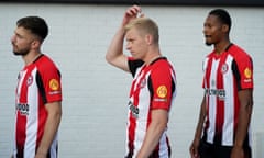 Left to right, Brentford's Halil Dervisoglu, Ben Mee and Ethan Pinnock before their pre-season friendly against Boreham Wood