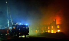 Fire fighters tackling a blaze, Friday 23 January 2004 at Gleddoch House a five-star hotel and spa near Greenock in Inverclyde, Scotland.