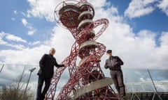 Anish Kapoor (left) and Carsten Höller pose in front of the ArcelorMittal Orbit tower