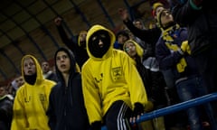 Beitar Jerusalem fans watch a home game at Teddy stadium in Israel