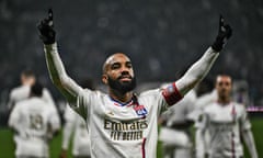 FBL-FRA-LIGUE1-LYON-TOULOUSE<br>Lyon's French forward #10 Alexandre Lacazette celebrates after scoring a goal during the French L1 football match between Olympique Lyonnais (Lyon) and Toulouse (TFC) at the Groupama Stadium in Lyon, central eastern France, on December 10, 2023. (Photo by OLIVIER CHASSIGNOLE / AFP) (Photo by OLIVIER CHASSIGNOLE/AFP via Getty Images)