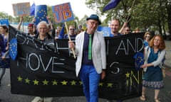 Programme Name: Bob & Roberta's Excellent Protest Adventure - TX: 17/11/2016 - Episode: Bob & Roberta's Excellent Protest Adventure (No. 1) - Picture Shows: Bob & Roberta Smith protesting with one of his own placards Bob, Roberta - (C) BBC - Photographer: Bianca Zamfira