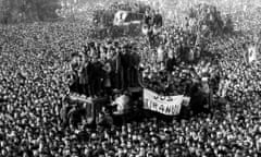 Romanian demonstrators gathered in front of the headquarters of  the Romanian Communist Party in Bucharest during the 1989 anti-communist revolution, 22 December 1989.