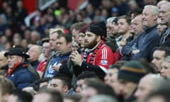 Manchester United v Swansea City - Premier League<br>MANCHESTER, ENGLAND - JANUARY 02:  Manchester United fans watch from the stand during the Barclays Premier League match between Manchester United and Swansea City at Old Trafford on January 2, 2016 in Manchester, England.  (Photo by John Peters/Man Utd via Getty Images)