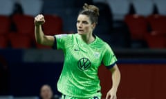 Dominique Janssen celebrates scoring opening goal for Wolfsburg.