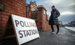 A voter arrives at a polling station to vote in the Rochdale by-election on February 29, 2024 in Rochdale, England.
