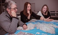 Investigators pore over a map