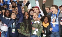 Students from Marjory Stoneman Douglas high school stand together on stage with other young victims of gun violence at the conclusion of the March for Our Lives rally in Washington.