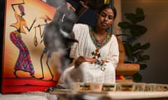 Yalemzerf Adam, a friend of the restaurant, performs a traditional Ethiopian coffee ceremony.