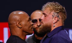 Mike Tyson, left, and YouTuber Jake Paul face off during a press conference at the Apollo Theatre in May.