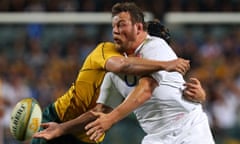 England’s Steve Thompson is tackled against Australia in 2010