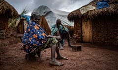 Dina and her husband, Michel, in Rho camp for internally displaced people, Ituri province, DRC.