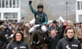 Nico de Boinville celebrates winning the 3 Queen Mother Champion Chase on Altior.