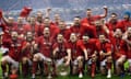 Wales celebrate winning the Six Nations championship and the grand slam