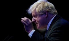 Boris Johnson – seen spotlit and gesturing against a black background – delivers his Brexit speech to the Conservative Home meeting, Birmingham, October 2018