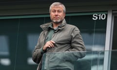 Roman Abramovich looks on from the stands during the Premier League match against Manchester City.