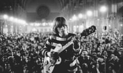 Brian Jones plays with his back to the audience at the Stones’ All Night Rave at Alexandra Palace, 26 June 1964.