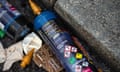 Discarded cans of nitrous oxide