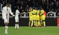 Nantes' players celebrate after Lyon's Castello Lukeba scored an own goal during the French League One soccer match between Lyon and Nantes at the Groupama stadium, in Decines, near Lyon, France, Friday, March 17, 2023. (AP Photo/Laurent Cipriani)