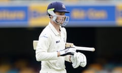 Peter Handscomb carrying a cricket bat