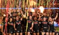 Penrith Panthers celebrate with the premiership trophy after winning the 2023 NRL grand final against Brisbane Broncos at Accor Stadium.