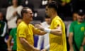 Australia's Thanasi Kokkinakis celebrates with Lleyton Hewitt after his win over Dominic Stricker in the opening rubber in the Davis Cup tie against Switzerland.