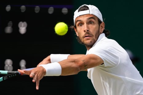 Lorenzo Musetti eyes a forehand return during his victory over Francisco Comesana.