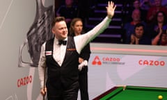Shaun Murphy celebrates victory in his first round at the World Snooker Championships.