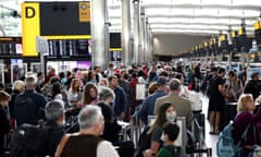 Passengers queue inside the departures terminal of Terminal 2 at Heathrow Airport in London, Britain, on 27 June 2022.