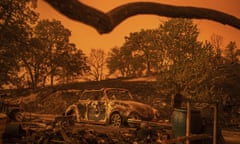 A Volkswagen Beetle scorched by a wildfire called the Carr Fire rests at a residence in Redding, Calif., Friday, July 27, 2018. (AP Photo/Noah Berger, File)