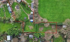 Drone image showing the garden glamping site shown backing on to other properties