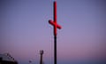 One of the giant red inverted crosses at the Hobart waterfront for Dark Mofo