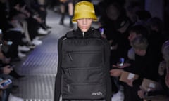 A model at Prada’s show in Milan wears a design by Rem Koolhaus that was like a reverse jetpack.
