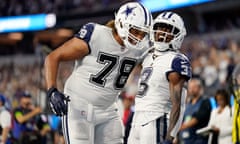 Dallas Cowboys wide receiver Brandin Cooks (3) celebrates after catching a touchdown with offensive tackle Terence Steele