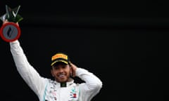  Lewis Hamilton celebrates on the podium after winning the Mexican Grand Prix.