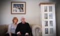 John and Ange Maher at home with the family portrait behind them that their granddaughter Carmen is superimposed into.