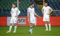 Northern Ireland's Steven Davis, Conor Washington and Craig Cathcart cannot hide their dejection during the defeat by Bulgaria in Sofia.