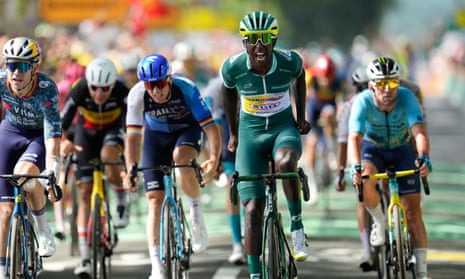 Biniam Girmay celebrates victory before Mark Cavendish was relegated from his fifth-place finish.