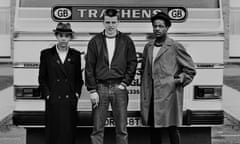 Pauline Black of the Selecter, Graham ‘Suggs’ McPherson of Madness and Neville Staple of the Specials photographed with their tour bus in Brighton, October 1979.