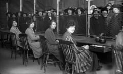 Cashiers wait to pay out weekly allowances in a Government unemployment scheme, January 1919.