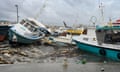 Damaged fishing boats rest on the shore after the passing of Hurricane Beryl at the Bridgetown Fish Market, Bridgetown, Barbados on July 1