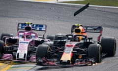 Max Verstappen is clipped by Esteban Ocon while leading F1’s Brazilian Grand Prix