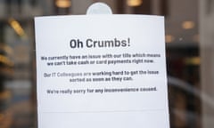 A sign in a Greggs bakery at Ludgate hill in London. Greggs says it is working to resolve the IT problem ‘as soon as possible’.