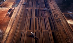 File photo of bucket-wheel reclaimers moving iron ore at a loading terminal in the town of Port Hedland<br>Bucket-wheel reclaimers move iron ore at a loading terminal in the town of Port Hedland, located in the Pilbara region of Western Australia in this December 3, 2013 file photo. Australia is expected to release GDP data this week. REUTERS/David Gray/Files GLOBAL BUSINESS WEEK AHEAD PACKAGE - SEARCH ‘BUSINESS WEEK AHEAD NOVEMBER 30’ FOR ALL IMAGES