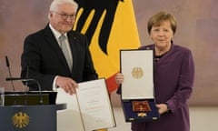 Angela Merkel receives the Großkreuz from Frank-Walter Steinmeier on Monday