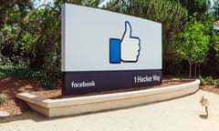 A Facebook like icon displayed on a sign outside the main entrance to their California headquarters