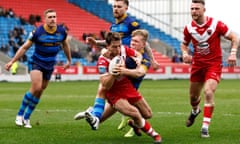 Chris Atkin scores Salford’s second try of the game against Wakefield despite the attempted tackle by an opposing player