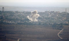 Smoke from explosions during fighting in the Syrian village of Jubata al-Khashab.