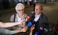 Michel Platini, right, and his lawyer William Bourdon answer reporters after Platini has been freed, outside the French police anti-corruption and financial crimes office in Nanterre, outside Paris, early Wednesday, June 19, 2019. Former UEFA president Michel Platini proclaimed his innocence during police questioning Tuesday following his arrest as part of a corruption probe into the vote that gave the 2022 World Cup to Qatar. (AP Photo/ Francois Mori)