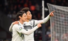 Leroy Sane (right) of Germany celebrates with teammate Nico Schulz.